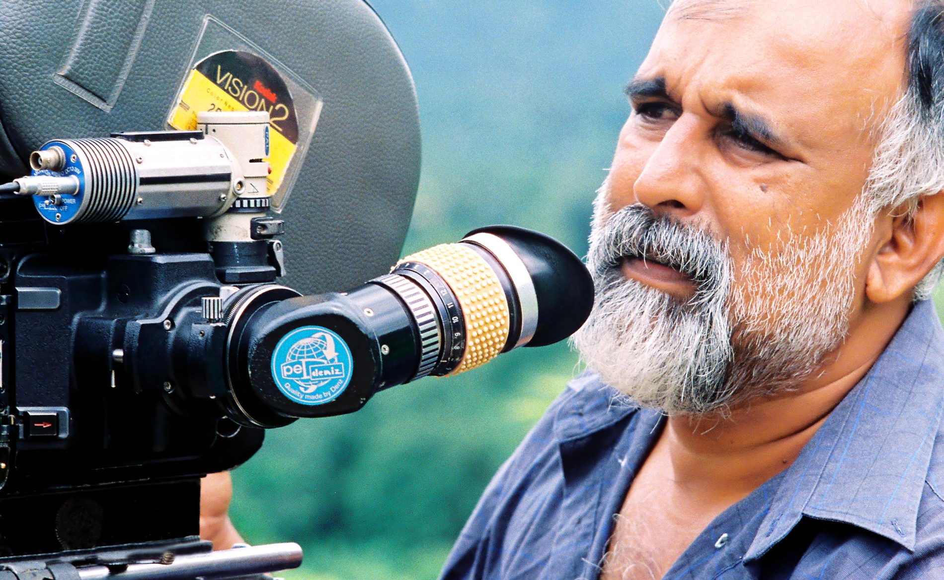 Sarath Dharmasiri beside a 35mm camera loaded with Kodak Vision2 stock.